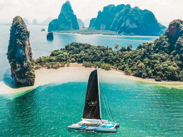 Luxury power catamaran sailing through Phang Nga Bay on a James Bond Island Tour from Phuket