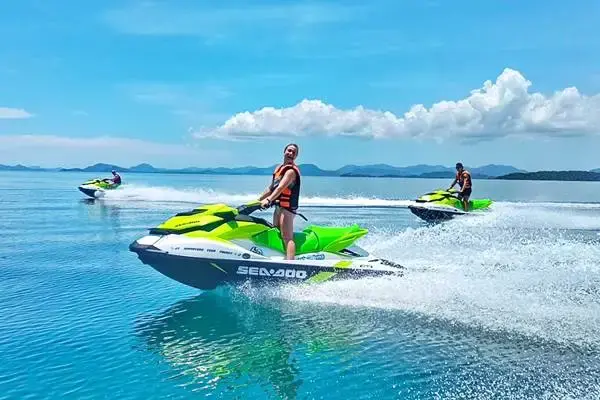 Phuket jet ski tour riders on clear blue sea route