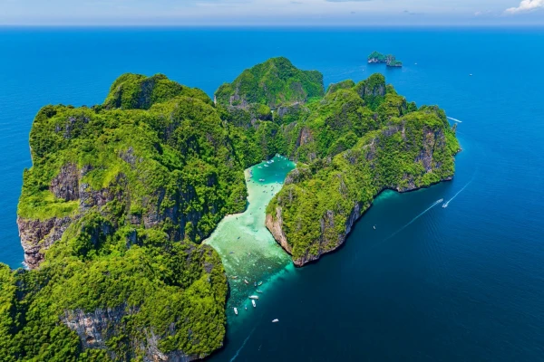 Aerial view of Phi Phi Island and Pileh Lagoon for Phi Phi Island Tour from Phuket with turquoise water and limestone cliffs