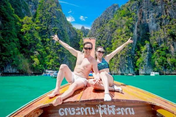 Travelers enjoying a tropical island journey during the Phi Phi Island and Bamboo Island Tour from Phuket