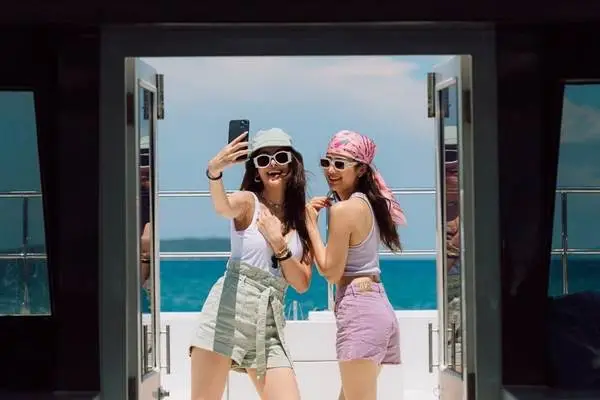Travelers enjoying the Phi Phi Island Tour by Power Catamaran from Phuket