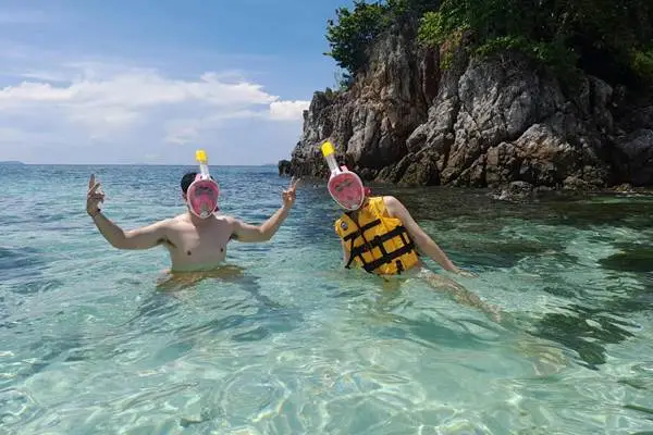 Guided Phuket jet ski adventure with tropical sea background
