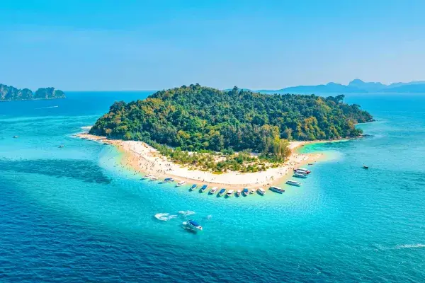 Snorkeling, swimming and relaxing on the white-sand beach at Bamboo Island during the Phi Phi Bamboo Island Tour from Phuket