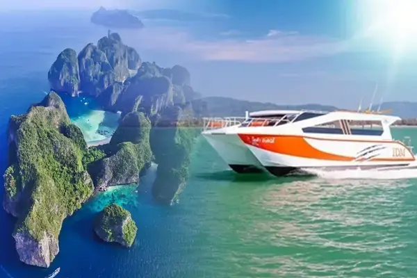 Speed catamaran cruising toward the limestone islands and turquoise lagoons of Phi Phi