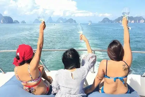 Travelers enjoying the return cruise before arriving in Phuket and transferring to their hotel