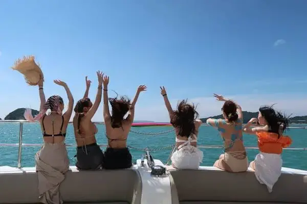 Return cruise toward Phuket with soft drinks and fruit onboard the Phi Phi Island Tour by Power Catamaran