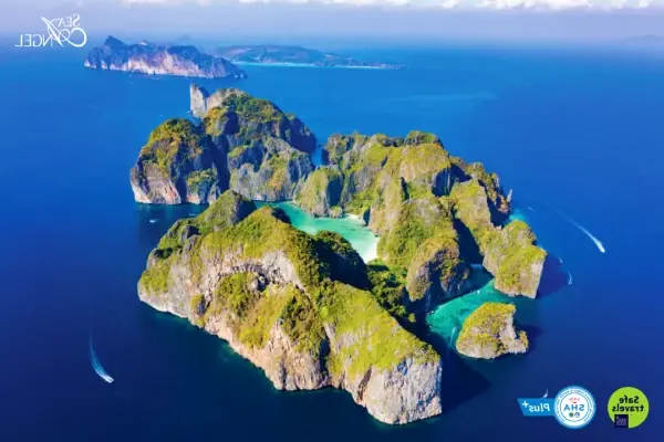 Aerial view of the Phi Phi Islands surrounded by the blue Andaman Sea