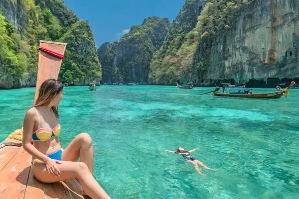 Swimming and sightseeing in emerald Pileh Lagoon on the Phi Phi Island and Bamboo Island Tour from Phuket