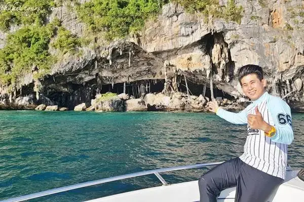 Sightseeing from the speedboat at Viking Cave on Phi Phi Leh Island during the Phi Phi Bamboo Island Tour from Phuket