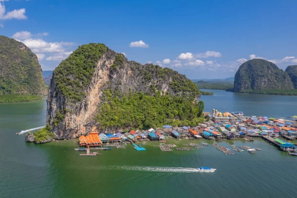 Aerial view of Panyee Island fishing village and limestone cliffs in Phang Nga Bay