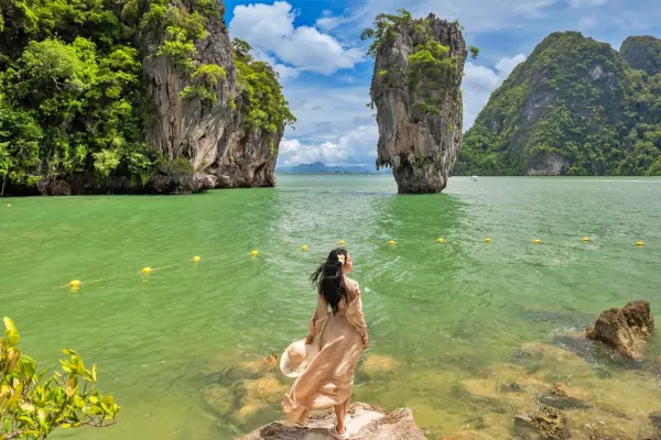 Traveler enjoying James Bond Island in Phang Nga Bay during the Phi Phi and James Bond Island tour from Phuket