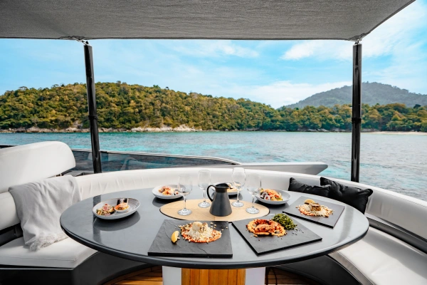 Luxury yacht dining and onboard service during the Phang Nga Bay tour from Phuket