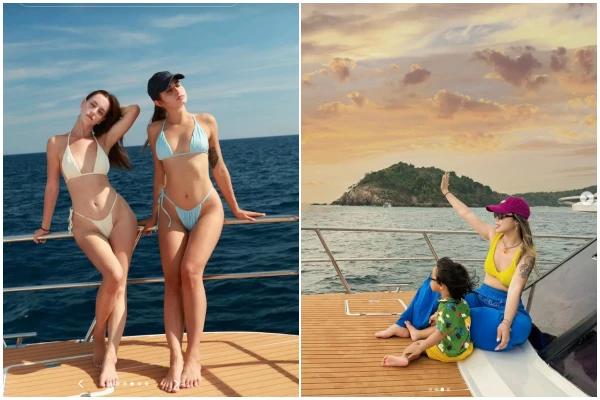 Guests relaxing on the catamaran deck during the sunset cruise back to Phuket