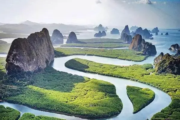 Aerial view of limestone islands and mangrove waterways around Panak Island in Phang Nga Bay