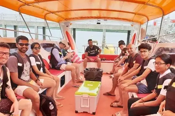 Small group passengers inside the speedboat during a James Bond Island sunset tour