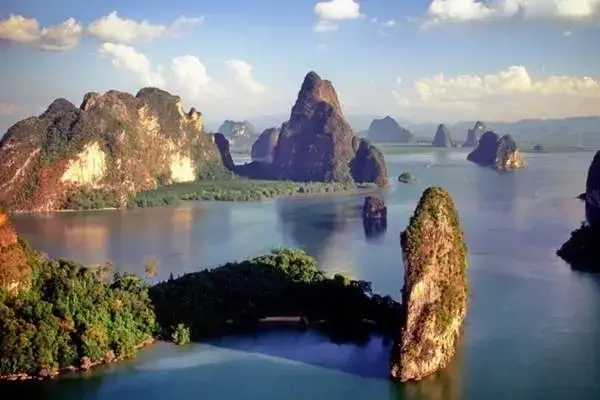 Panoramic view of limestone islands in Phang Nga Bay during a sunset tour from Phuket