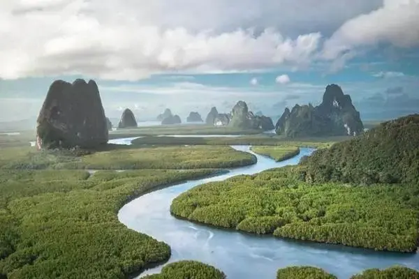 Mangrove waterways and limestone cliffs in Phang Nga Bay on a sunset tour from Phuket