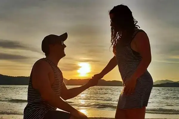 Couple enjoying a romantic sunset during the James Bond Island sunset tour from Phuket