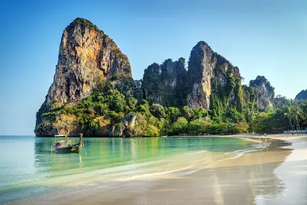 Phra Nang Beach in Krabi with limestone cliffs and longtail boat
