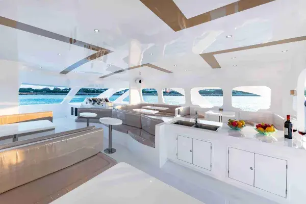 Spacious air-conditioned lounge inside the Phi Phi Maya Bay Maiton luxury catamaran