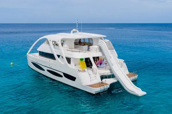 Luxury power catamaran with water slide for the Phi Phi Maya Bay Maiton Island tour