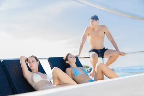 Guests relaxing on the comfortable catamaran before returning to Chalong Pier in Phuket