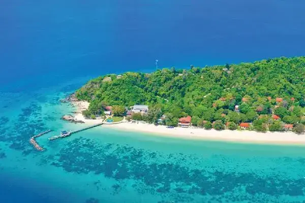 Aerial view of Maiton Island and turquoise sea on the Phi Phi Maya Bay Maiton luxury catamaran tour from Phuket