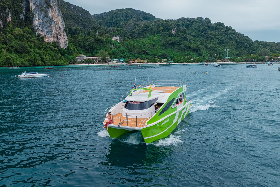 Speed catamaran leaving the Phi Phi Islands for the return journey to Phuket
