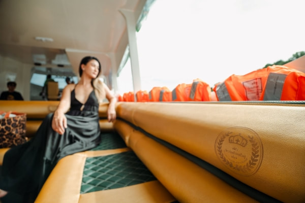 Passenger seating and life jackets inside the Phi Phi Island speed catamaran