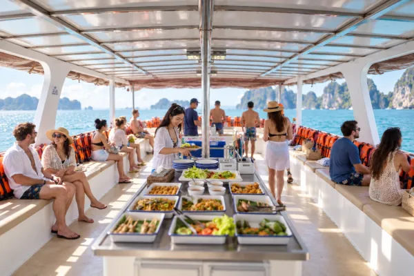 Guests enjoying a buffet meal on the James Bond Island Afternoon Tour boat in Phang Nga Bay