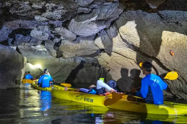 Sea cave canoeing through a limestone cave at Panak Island during the James Bond Island Afternoon Tour from Phuket