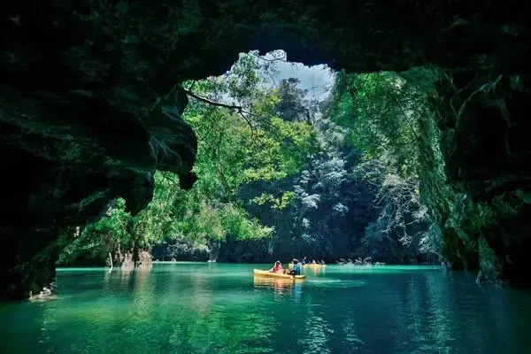 Canoeing into a hidden lagoon at Hong Island during the James Bond Island Afternoon Tour from Phuket