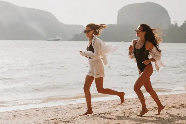 Guests enjoying free time on the beach during the James Bond Island Afternoon Tour from Phuket