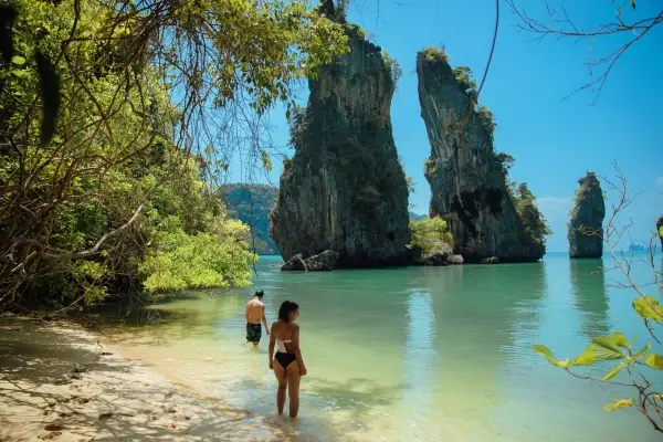 Guests enjoying a beach stop in Phang Nga Bay during the James Bond Island Afternoon Tour from Phuket
