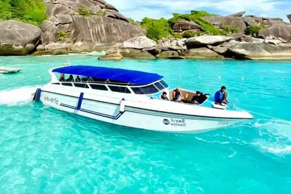 Speedboat on turquoise water during the James Bond Island late morning tour from Phuket