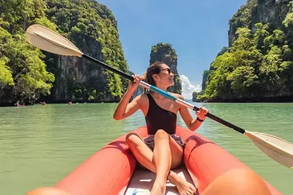 Sea cave canoeing among limestone cliffs on the James Bond Island late morning tour from Phuket