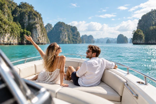 Guests cruising by speedboat through Phang Nga Bay on the James Bond Island late morning tour from Phuket