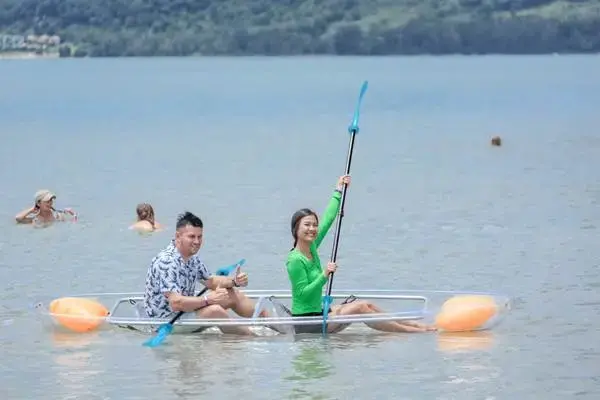 Guests kayaking in a clear kayak at Koh Yao Yai during the James Bond Island late morning tour from Phuket
