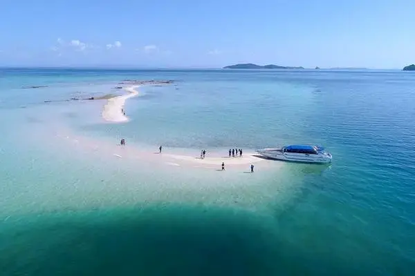 Aerial view of Laem Haad sandbar at Koh Yao Yai with a speedboat during the James Bond Island late morning tour
