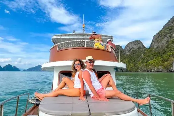 Guests relaxing on the big boat during the James Bond Island Sunset Plankton Tour in Phang Nga Bay