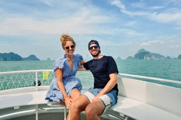 Couple relaxing on the big boat during the James Bond Island Sunset Plankton Tour in Phang Nga Bay