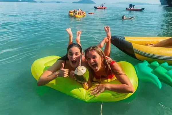 Guests swimming and relaxing in Phang Nga Bay during the James Bond Island Sunset Plankton Tour