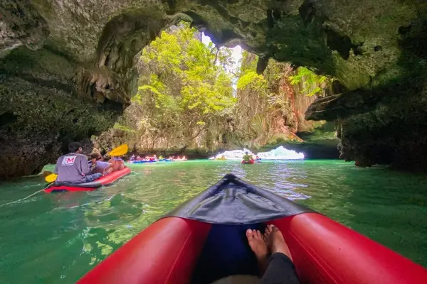 Sea cave canoeing through a hidden lagoon on the James Bond Island tour from Phuket