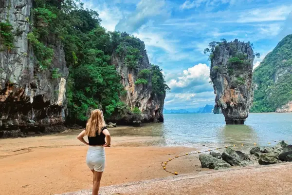 Tourist visiting James Bond Island and Khao Tapu in Phang Nga Bay