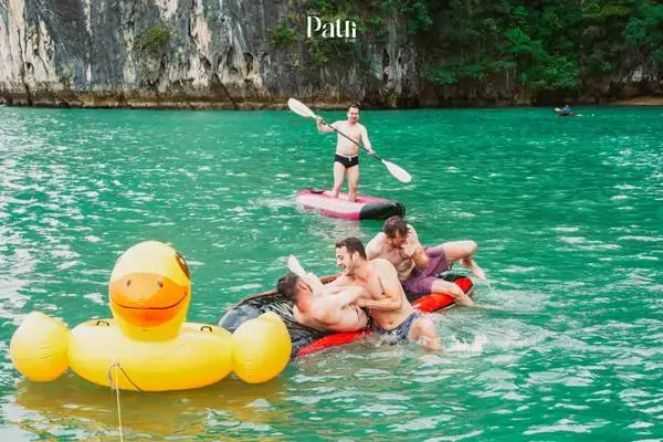 Guests swimming and relaxing during a James Bond Island Big Boat Tour from Phuket