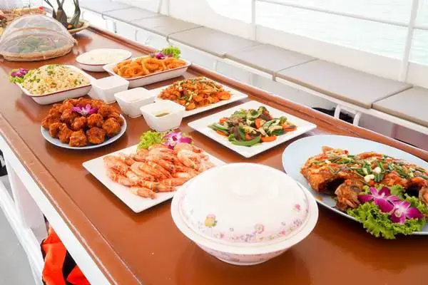 Buffet lunch dishes served onboard during a James Bond Island Big Boat Tour from Phuket