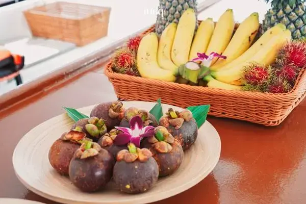 Fresh tropical fruit served onboard during a James Bond Island Big Boat Tour from Phuket