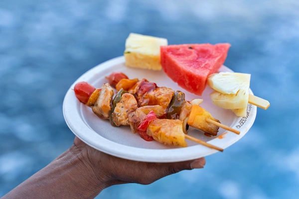 BBQ chicken and fresh fruit served on the Phi Phi Luxury Speed Catamaran Tour from Phuket
