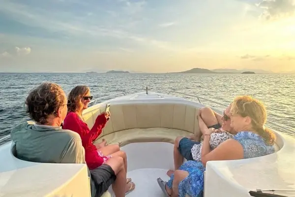 Tourists relaxing on a speedboat during the James Bond Island Tour from Phuket