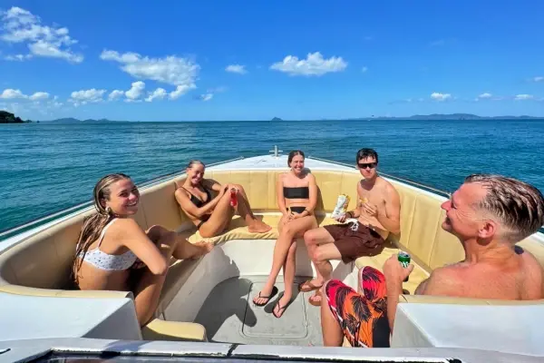 Tourists returning by speedboat after the James Bond Island Tour from Phuket